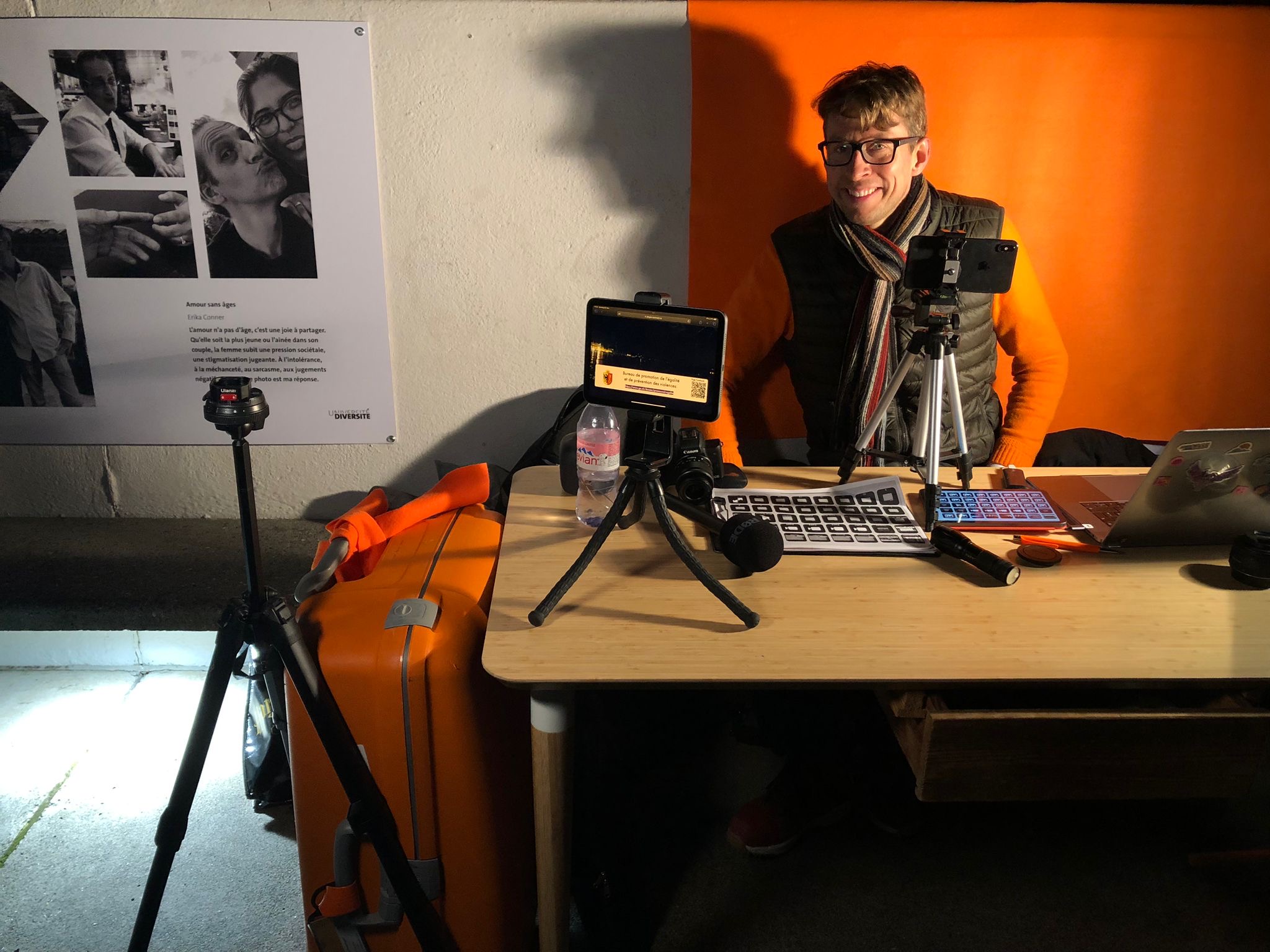 Daniel Schwenger at the mobile streaming desk with tablet, camera and laptop at the Bains des Pâquis